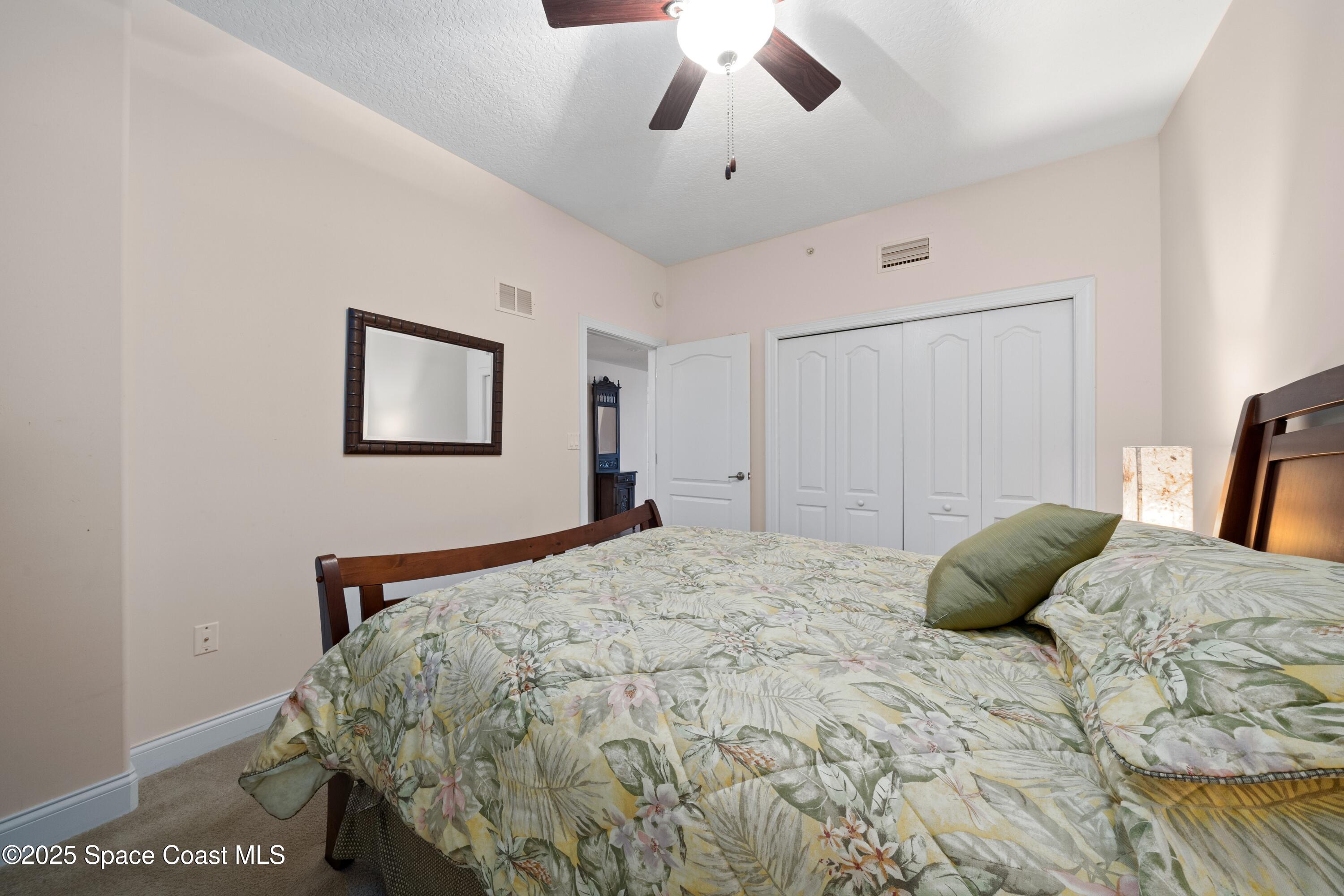 4975 Dixie Highway Northeast, Unit 703 Palm Bay, FL 32905 - Photo 18 of 28 Secondary Bedroom