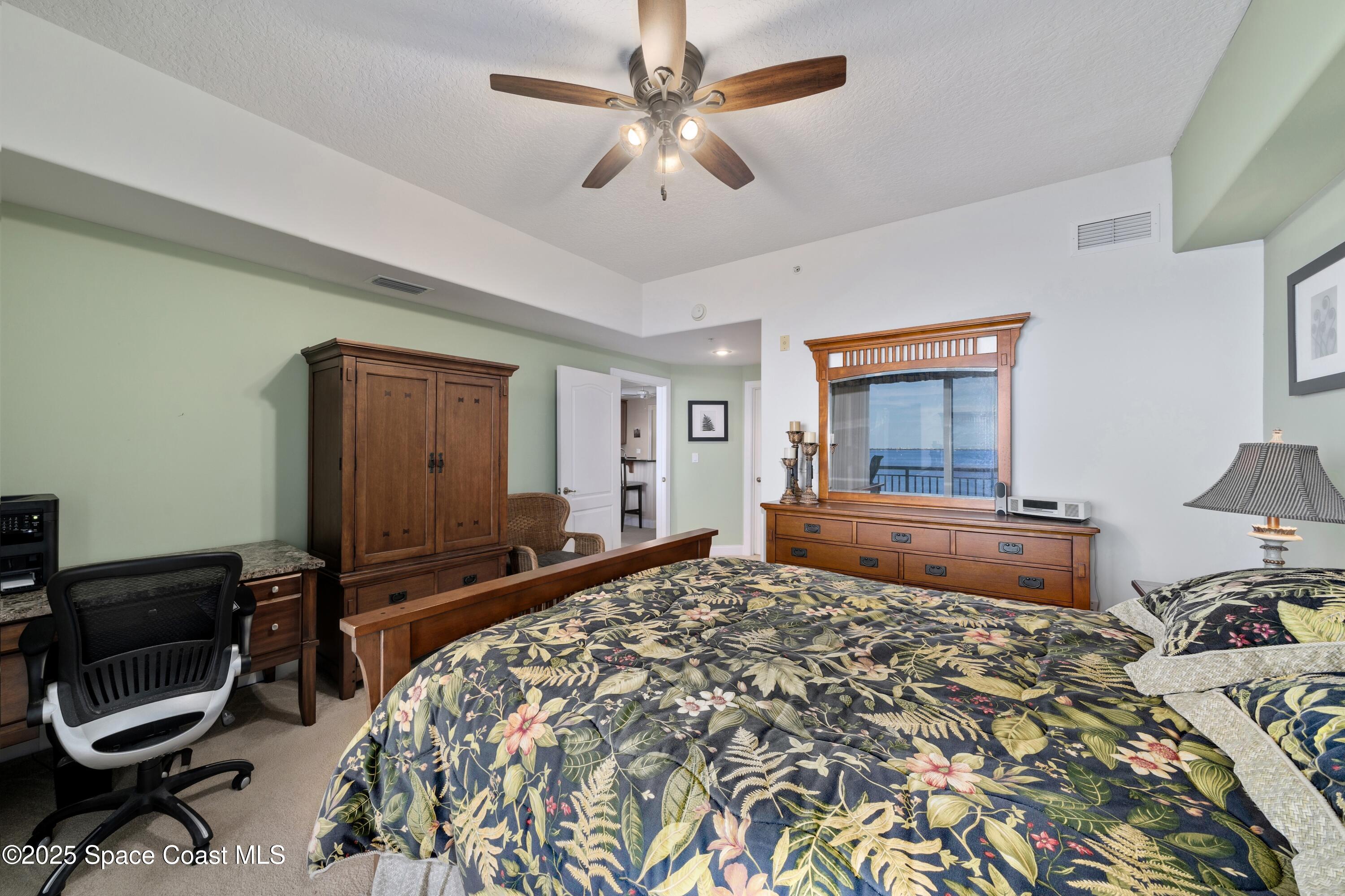 4975 Dixie Highway Northeast, Unit 703 Palm Bay, FL 32905 - Photo 7 of 28 Primary Bedroom