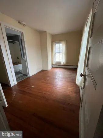 a view of empty room with front door