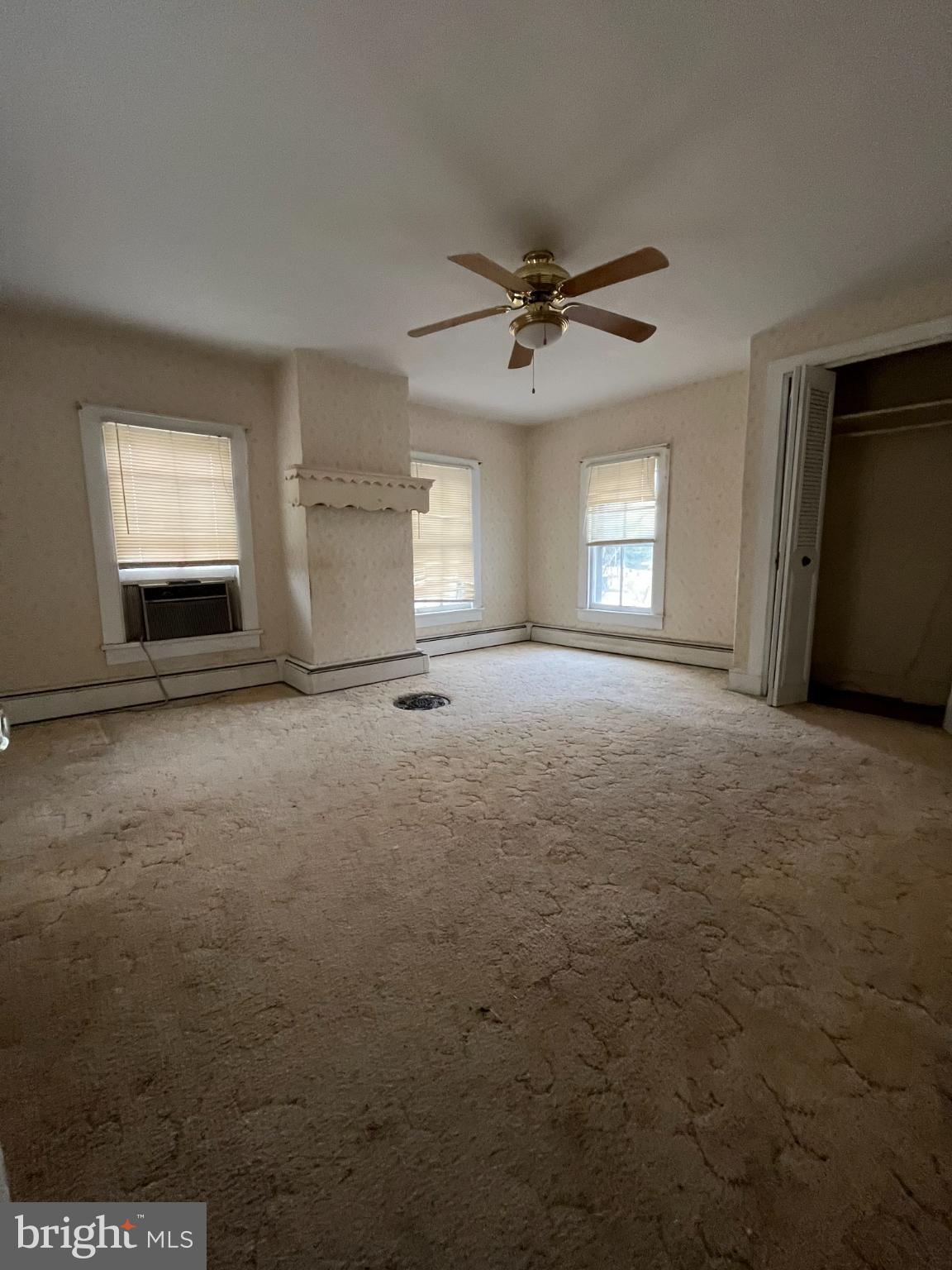 10603 Bishopville Road Bishopville, MD 21813 - Photo 20 of 28 a view of empty room with window and fireplace