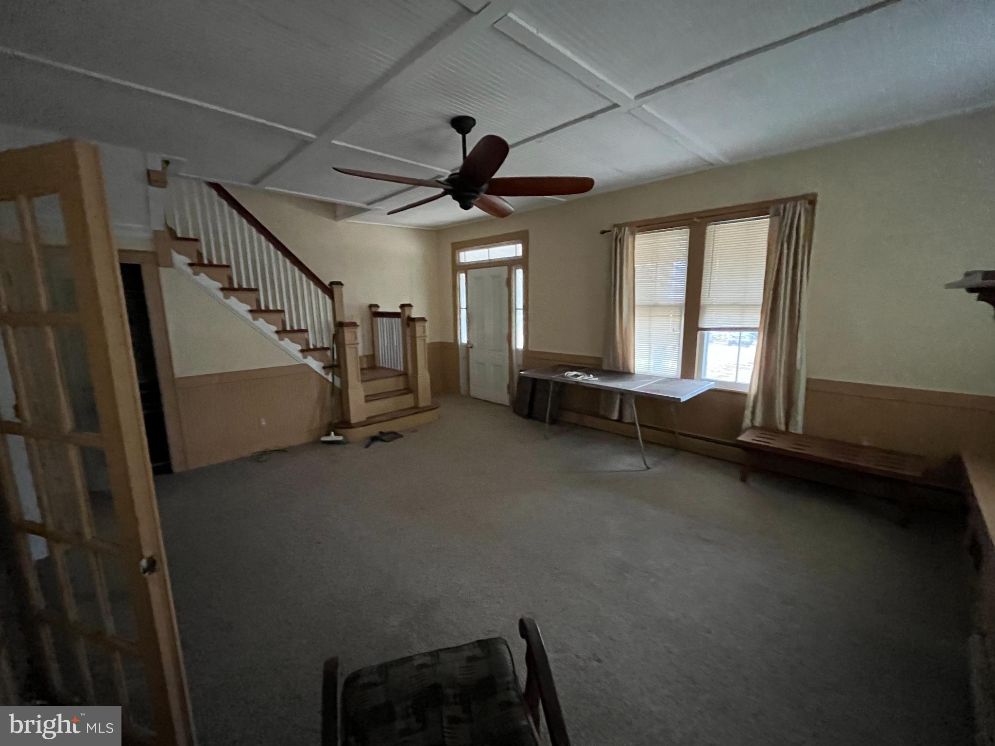 10603 Bishopville Road Bishopville, MD 21813 - Photo 4 of 28 a view of an empty room with a window
