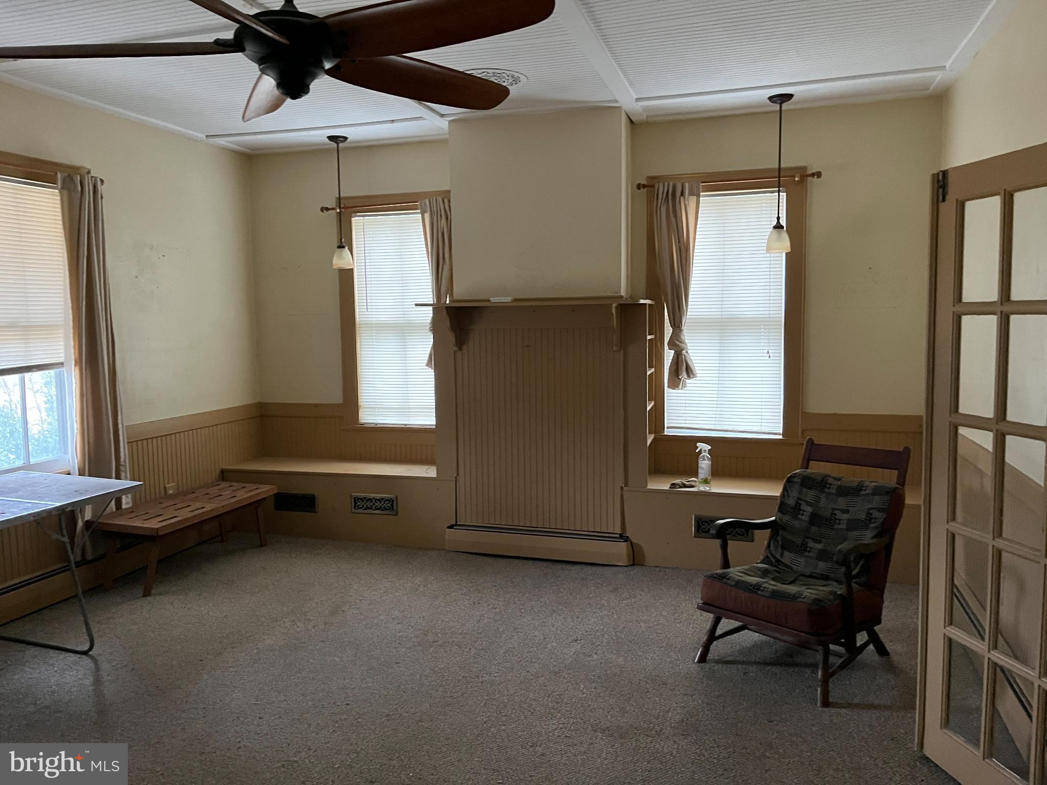 10603 Bishopville Road Bishopville, MD 21813 - Photo 5 of 28 a living room with furniture and a window
