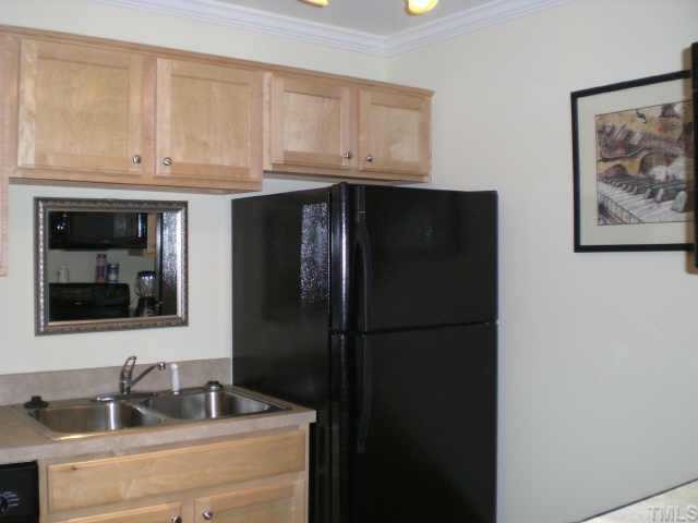 2304 Myron Drive, Unit 201 Raleigh, NC 27607 - Photo 5 of 12 a close view of a sink and cabinets