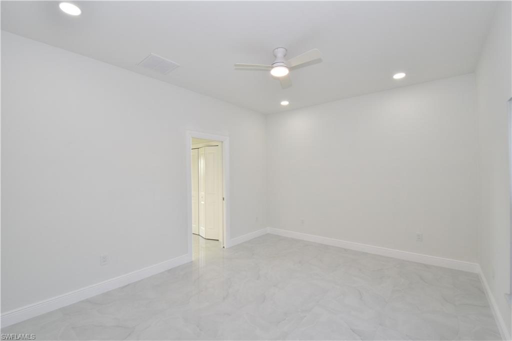349 Naples Avenue South Lehigh Acres, FL 33974 - Photo 13 of 22 a view of an empty room