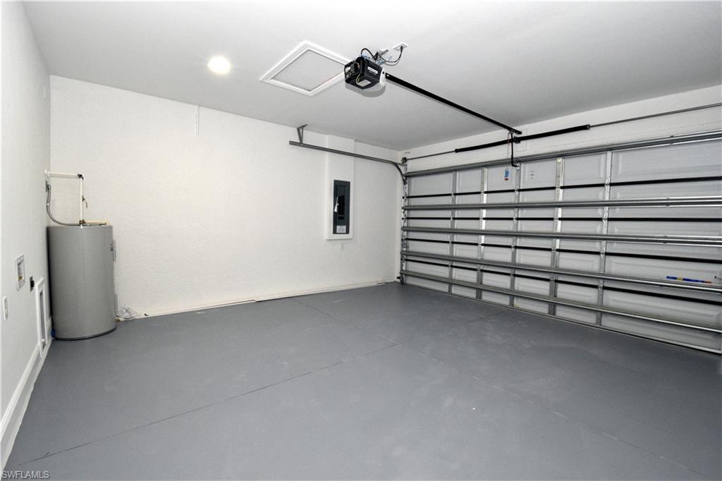 349 Naples Avenue South Lehigh Acres, FL 33974 - Photo 21 of 22 a view of a garage