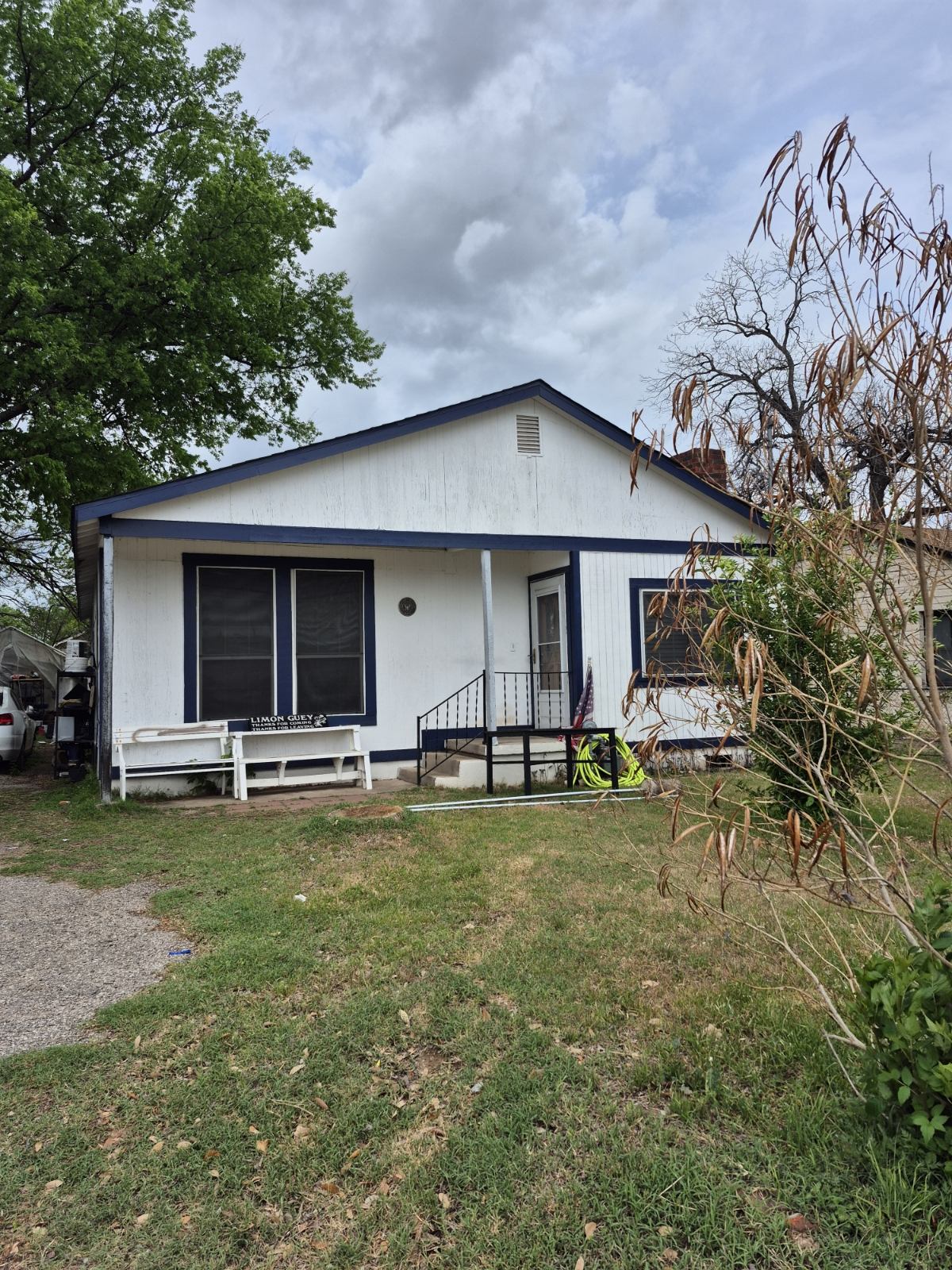 604 Springdale Road Austin, TX 78702 - Photo 3 of 5 View of front of property with a front lawn and a porch