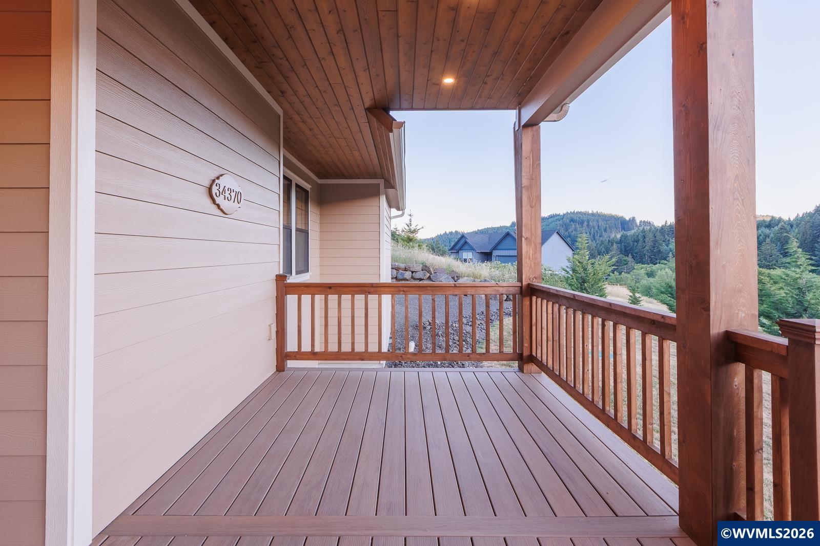 34370 Hawk Hill Road Philomath, OR 97370 - Photo 5 of 50 a view of balcony with wooden floor