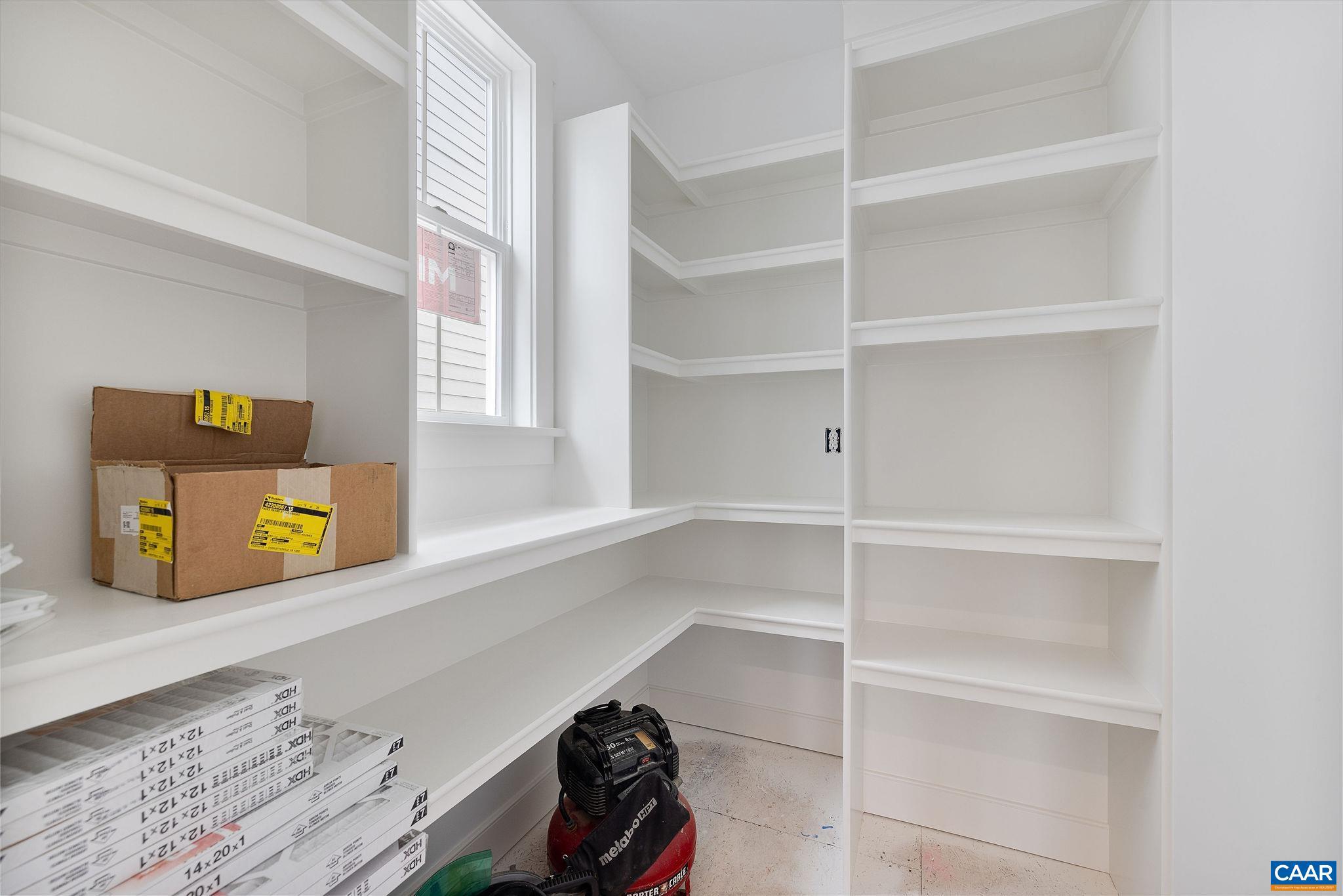444 Nicholson Street Charlottesville, VA 22901 - Photo 11 of 26 a view of walk in closet with empty racks