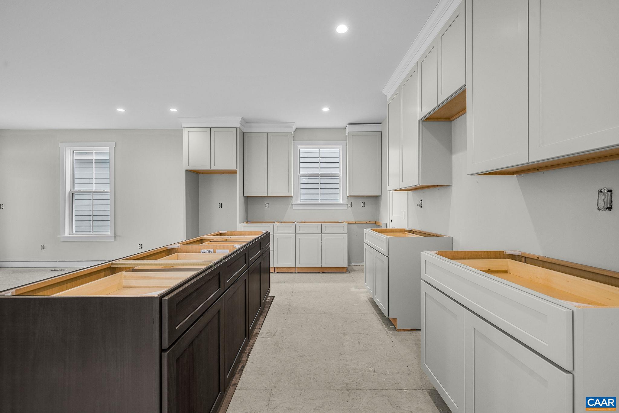 444 Nicholson Street Charlottesville, VA 22901 - Photo 7 of 26 a kitchen with a stove and a sink