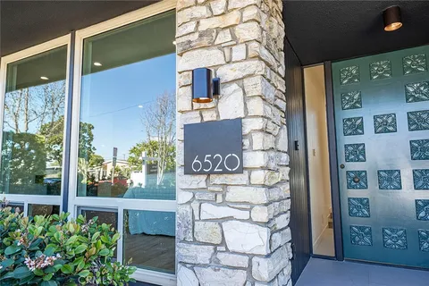 a front view of a house with a porch