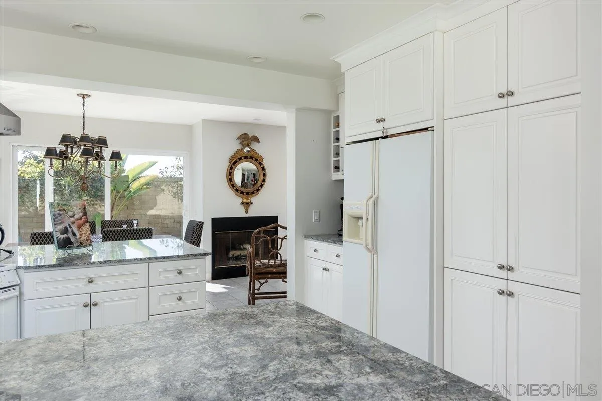 48 Half Moon Bend Coronado, CA 92118 - Photo 17 of 41 a view of kitchen with cabinets and wooden floor