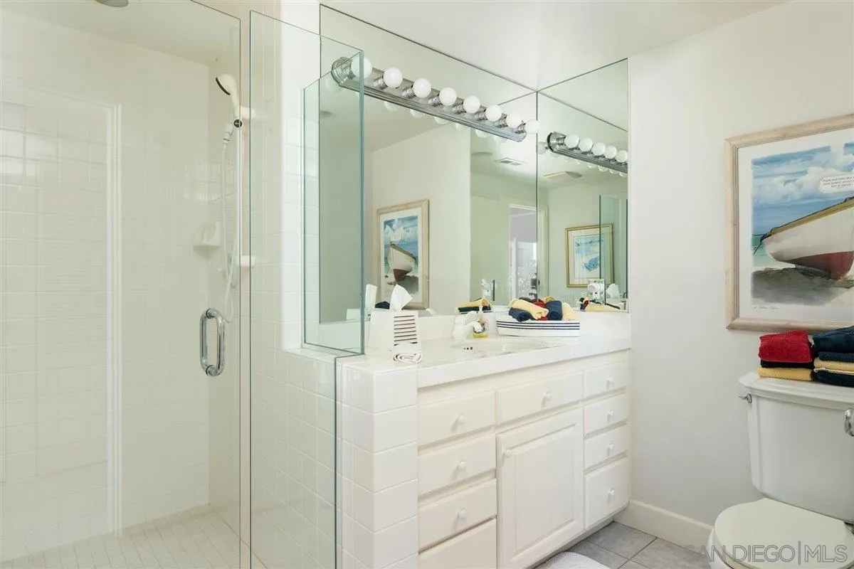 48 Half Moon Bend Coronado, CA 92118 - Photo 35 of 41 a bathroom with a sink a toilet and shower