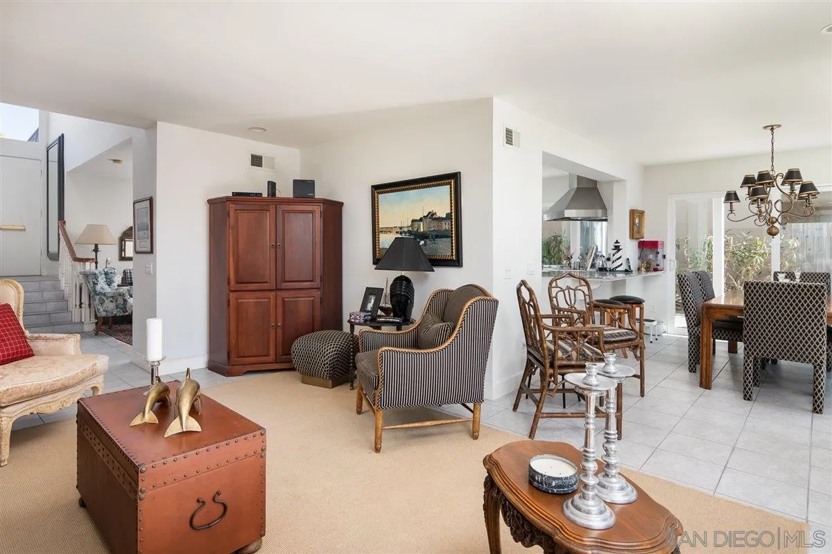 48 Half Moon Bend Coronado, CA 92118 - Photo 9 of 41 a living room with furniture and a chandelier
