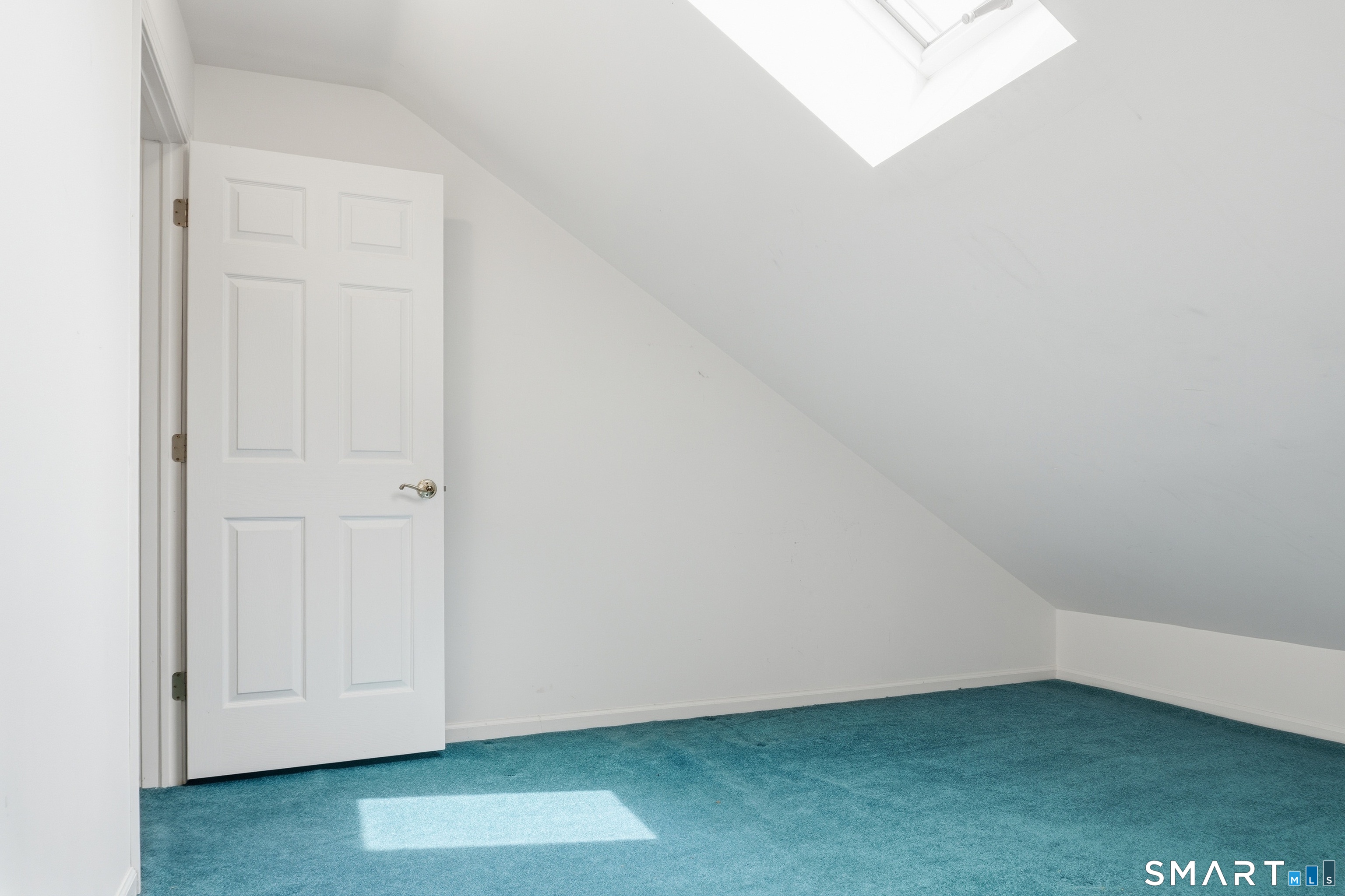 202 Stoney Way, Unit 202 New Fairfield, CT 06812 - Photo 11 of 18 an empty room with closet