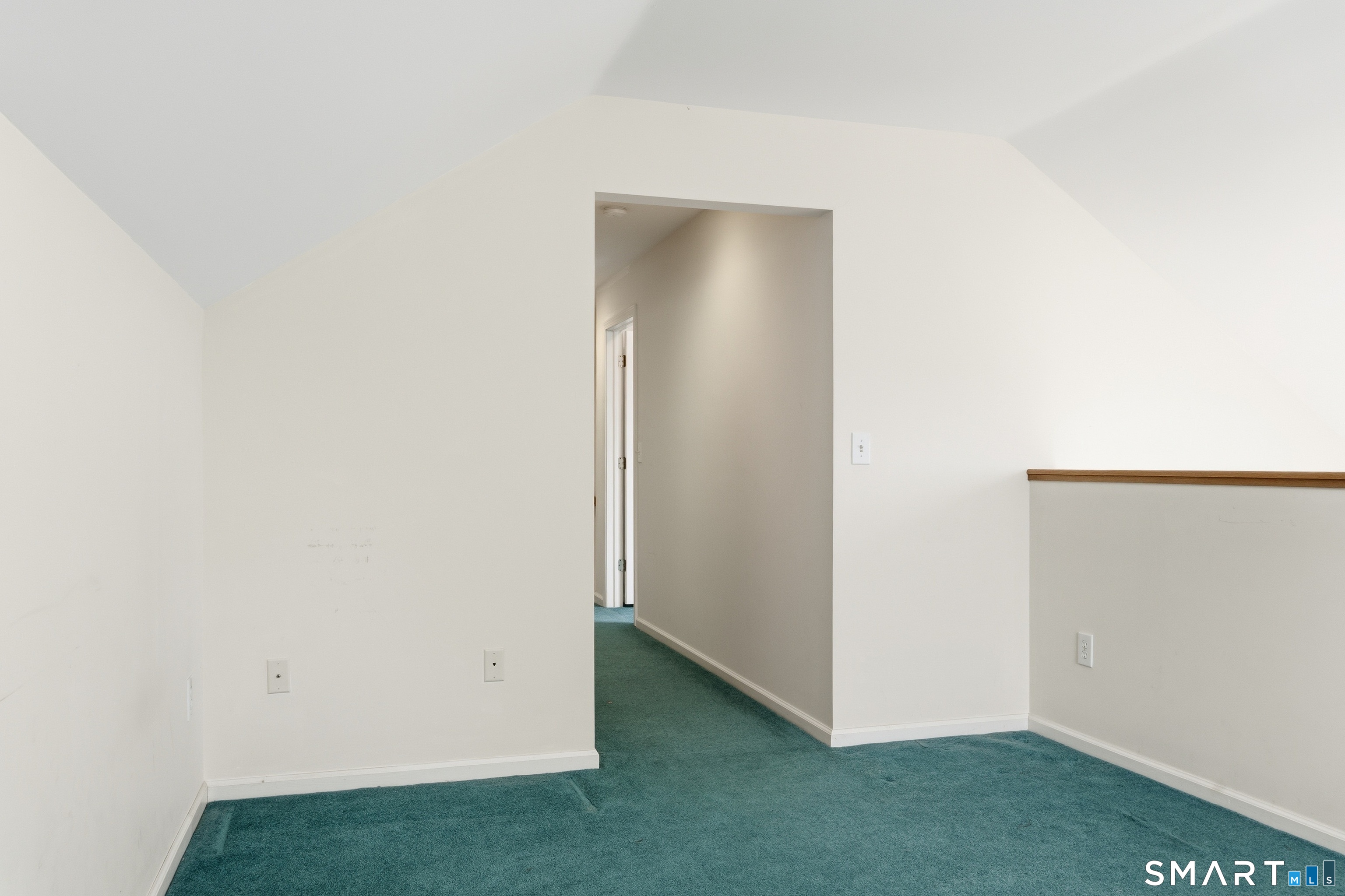 202 Stoney Way, Unit 202 New Fairfield, CT 06812 - Photo 16 of 18 a view of small space with a wooden floor