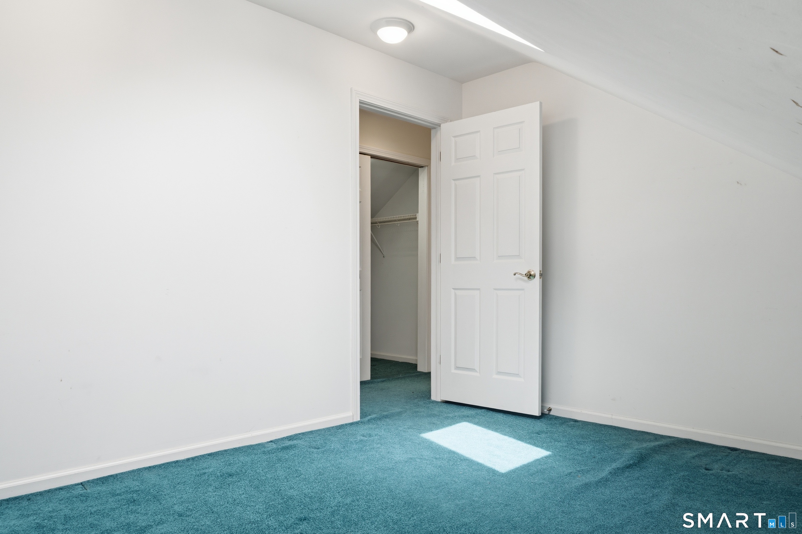 202 Stoney Way, Unit 202 New Fairfield, CT 06812 - Photo 10 of 18 a view of an empty room