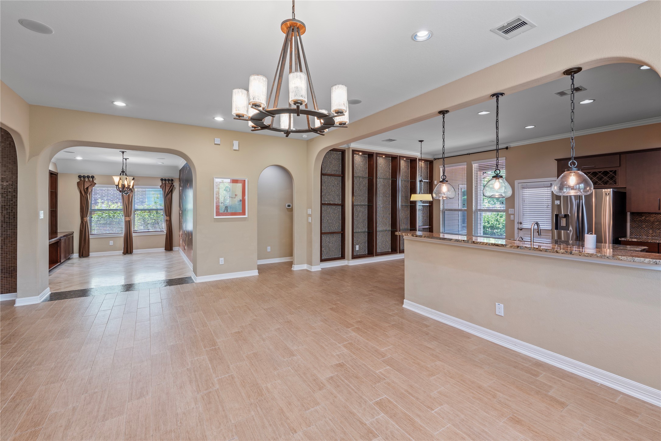 7423 Summer Night Lane Rosenberg, TX 77469 - Photo 16 of 44 a view of a hallway with chandelier