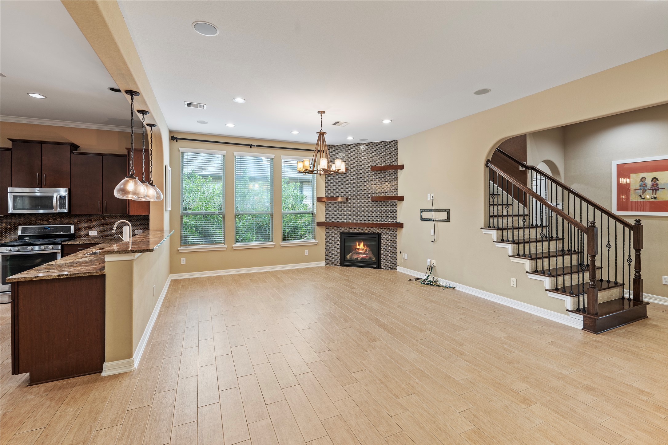 7423 Summer Night Lane Rosenberg, TX 77469 - Photo 18 of 44 a view of kitchen with furniture stove and refrigerator