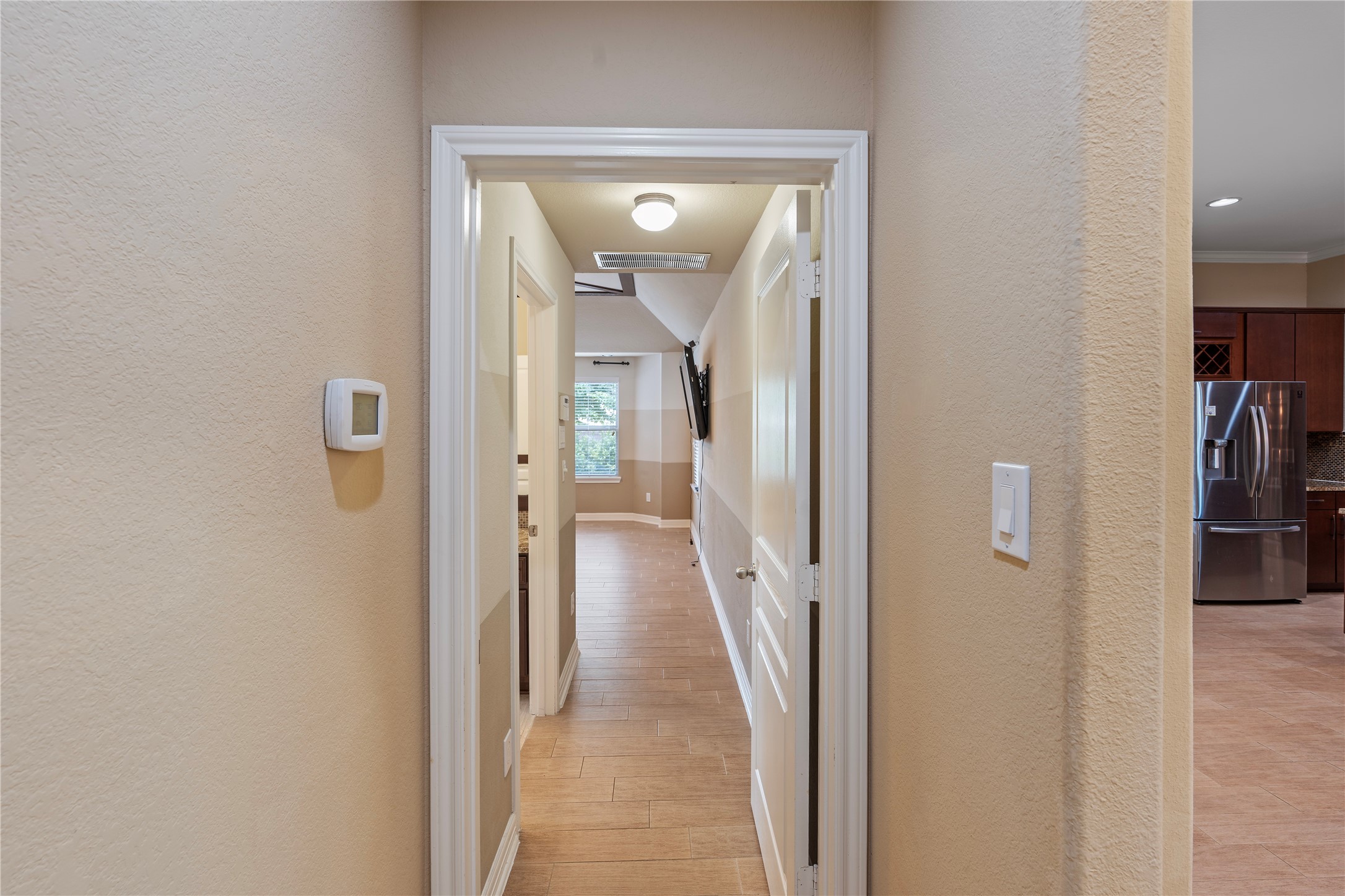 7423 Summer Night Lane Rosenberg, TX 77469 - Photo 24 of 44 a view of a hallway with a livingroom and furniture