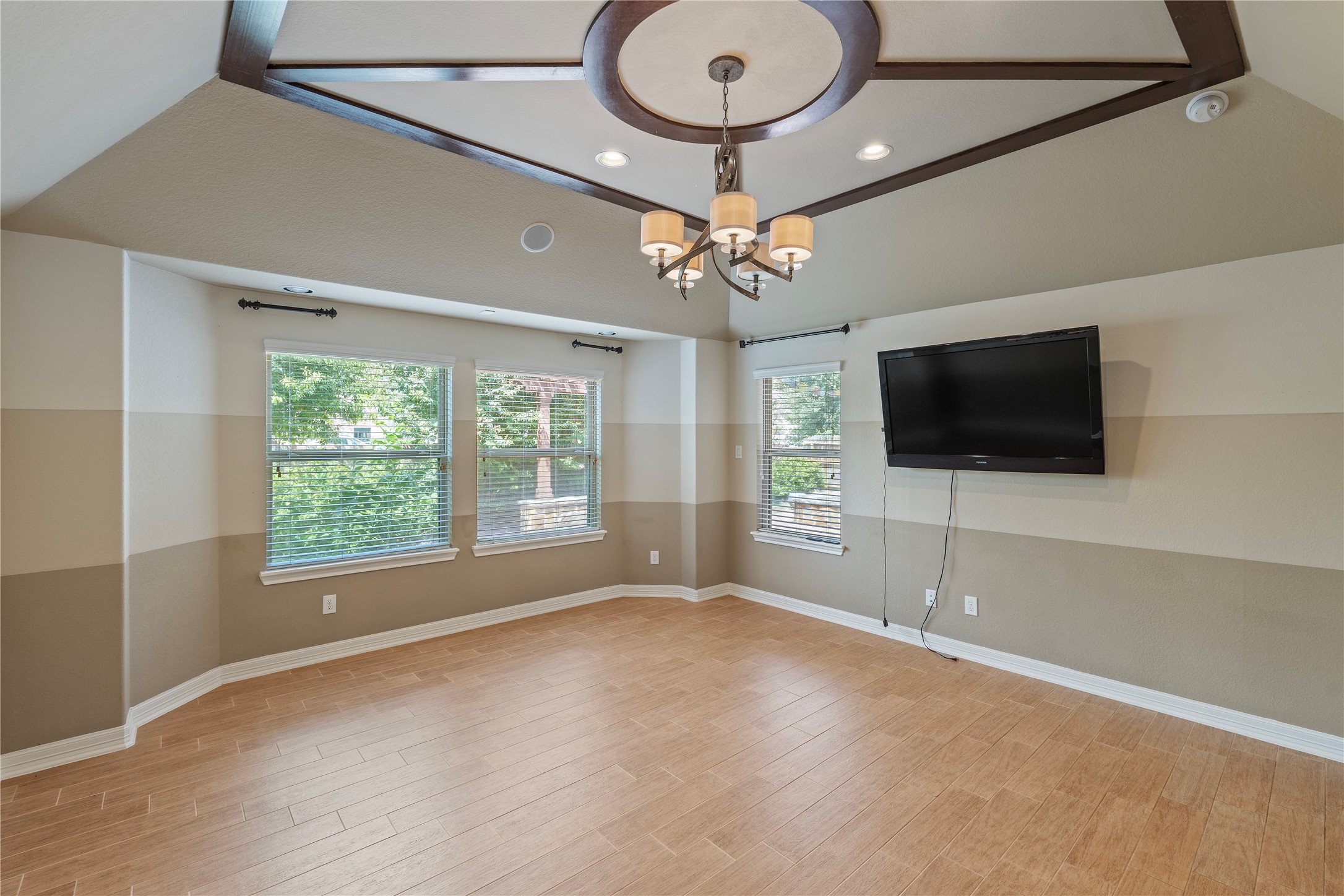 7423 Summer Night Lane Rosenberg, TX 77469 - Photo 26 of 44 a view of an empty room with a window and a flat screen tv