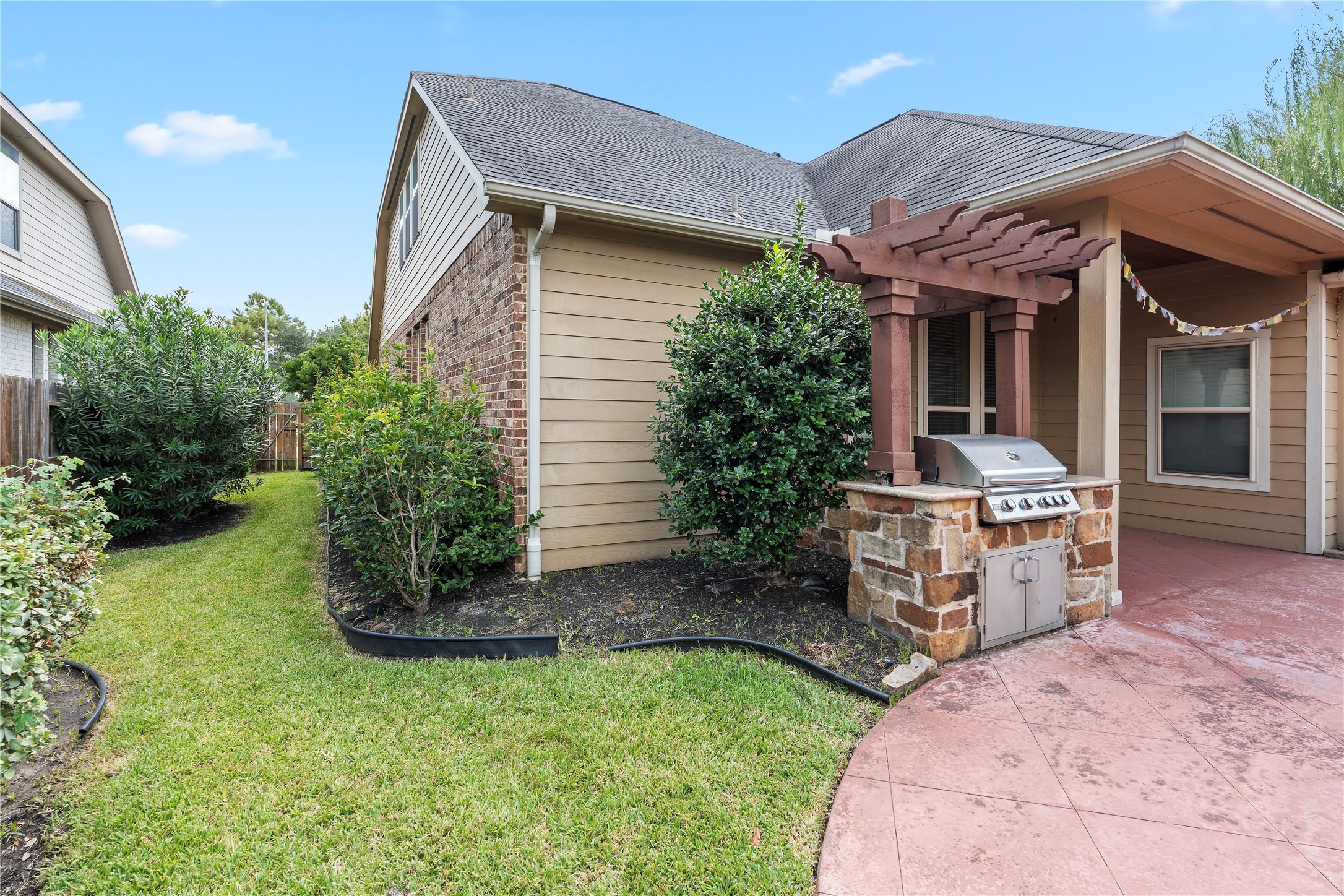 7423 Summer Night Lane Rosenberg, TX 77469 - Photo 39 of 44 a front view of a house with garden