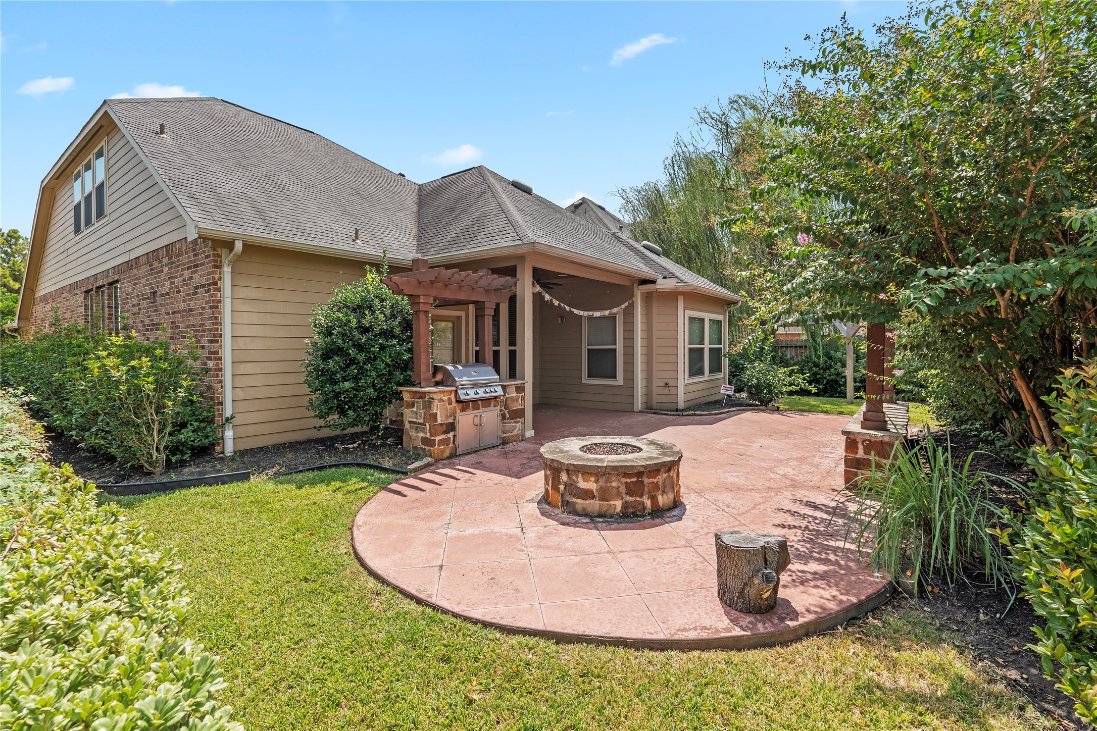 7423 Summer Night Lane Rosenberg, TX 77469 - Photo 41 of 44 a view of a house with backyard sitting area and garden