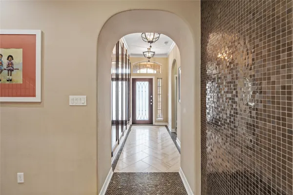 a view of a hallway with windows