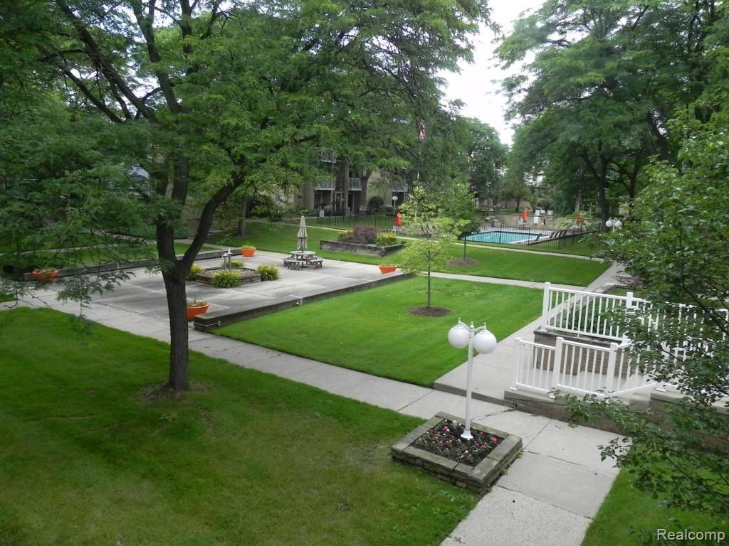 4905 Crooks Road, Unit 66 Royal Oak, MI 48073 - Photo 2 of 19 View from the large balcony over the courtyard & pool