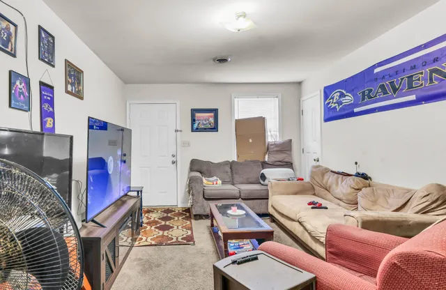 a living room with furniture and a couch