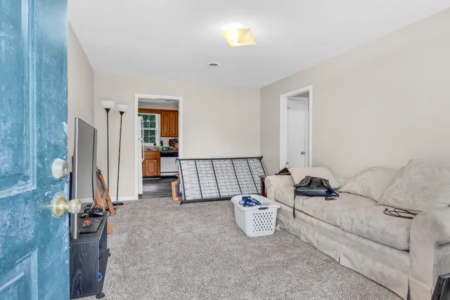 a room with furniture and gym equipment