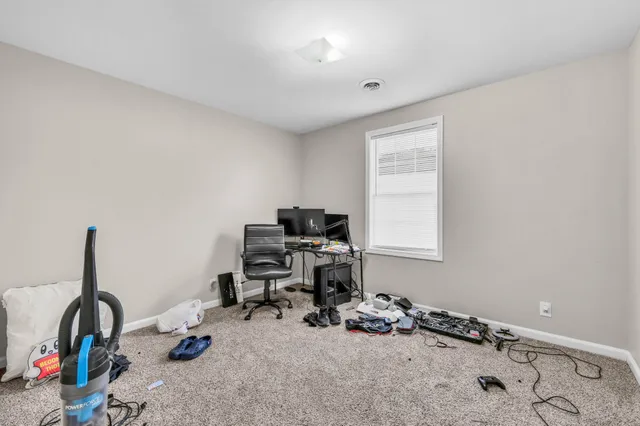 a bathroom with a sink toilet vanity and tub