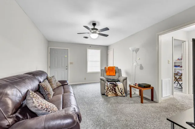 a dining room filled a table and chairs