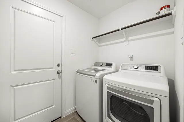 a utility room with dryer and washer