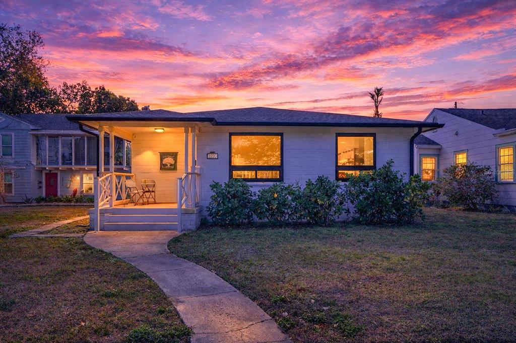 a front view of a house with yard