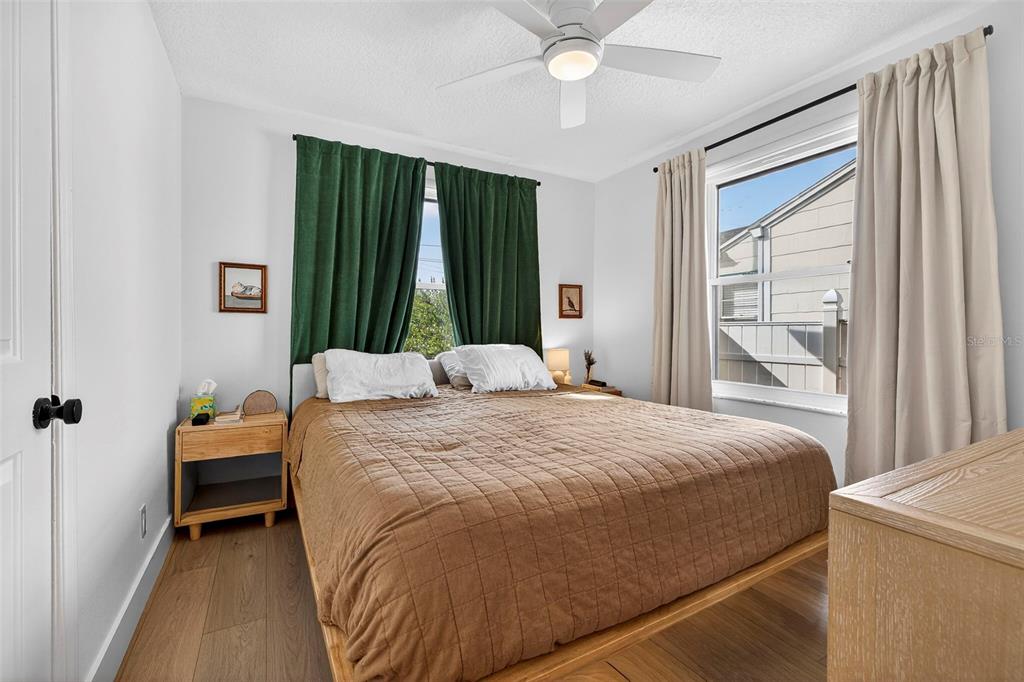 2220 7th Avenue North St. Petersburg, FL 33713 - Photo 17 of 31 a bedroom with a bed and a large window