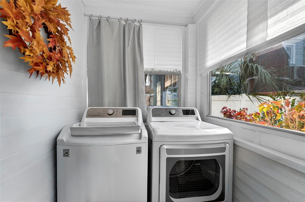 2220 7th Avenue North St. Petersburg, FL 33713 - Photo 21 of 31 a view of washer and dryer with bathroom in the background