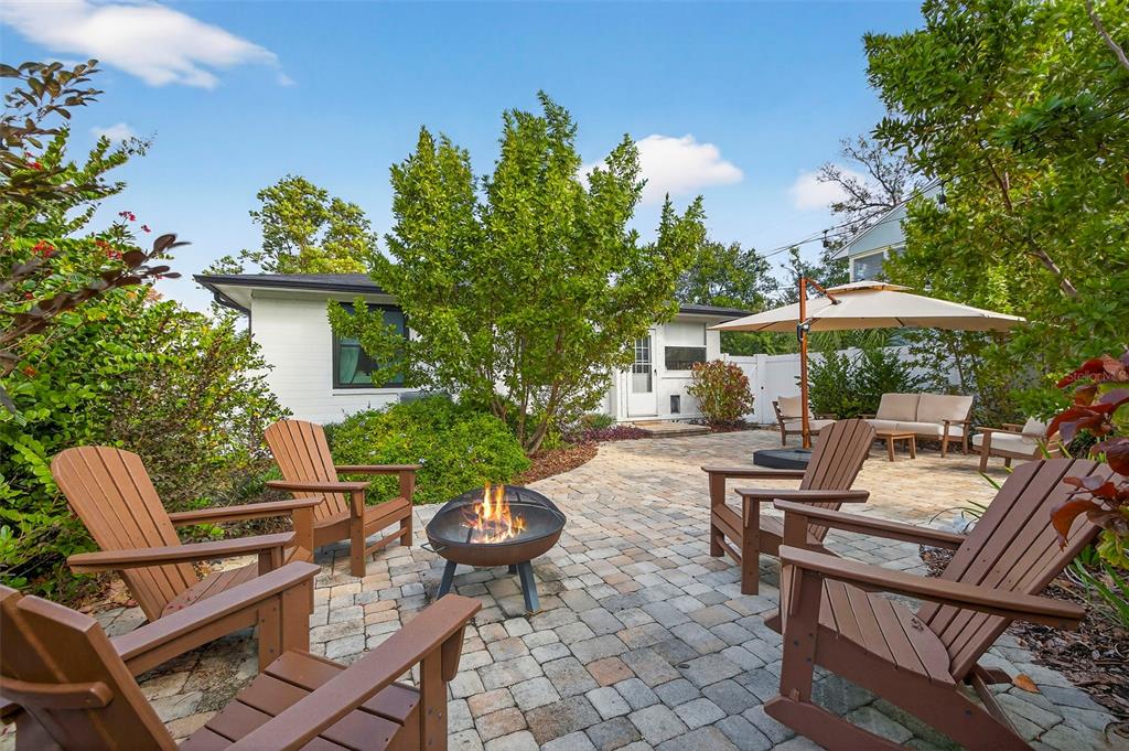 2220 7th Avenue North St. Petersburg, FL 33713 - Photo 27 of 31 a view of backyard with outdoor seating and plants