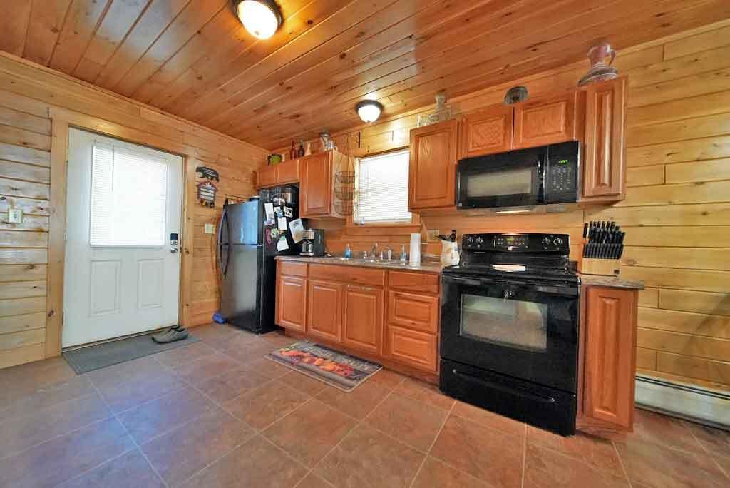 20 Hemore Road Houlton, ME 04730 - Photo 14 of 61 oak-kitchen-log-home