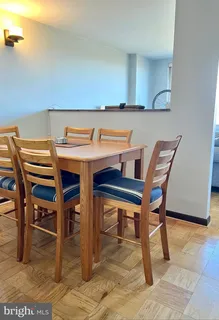 a view of a dining room with furniture