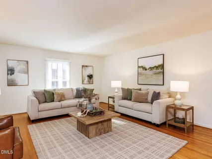 a living room with furniture and a couch