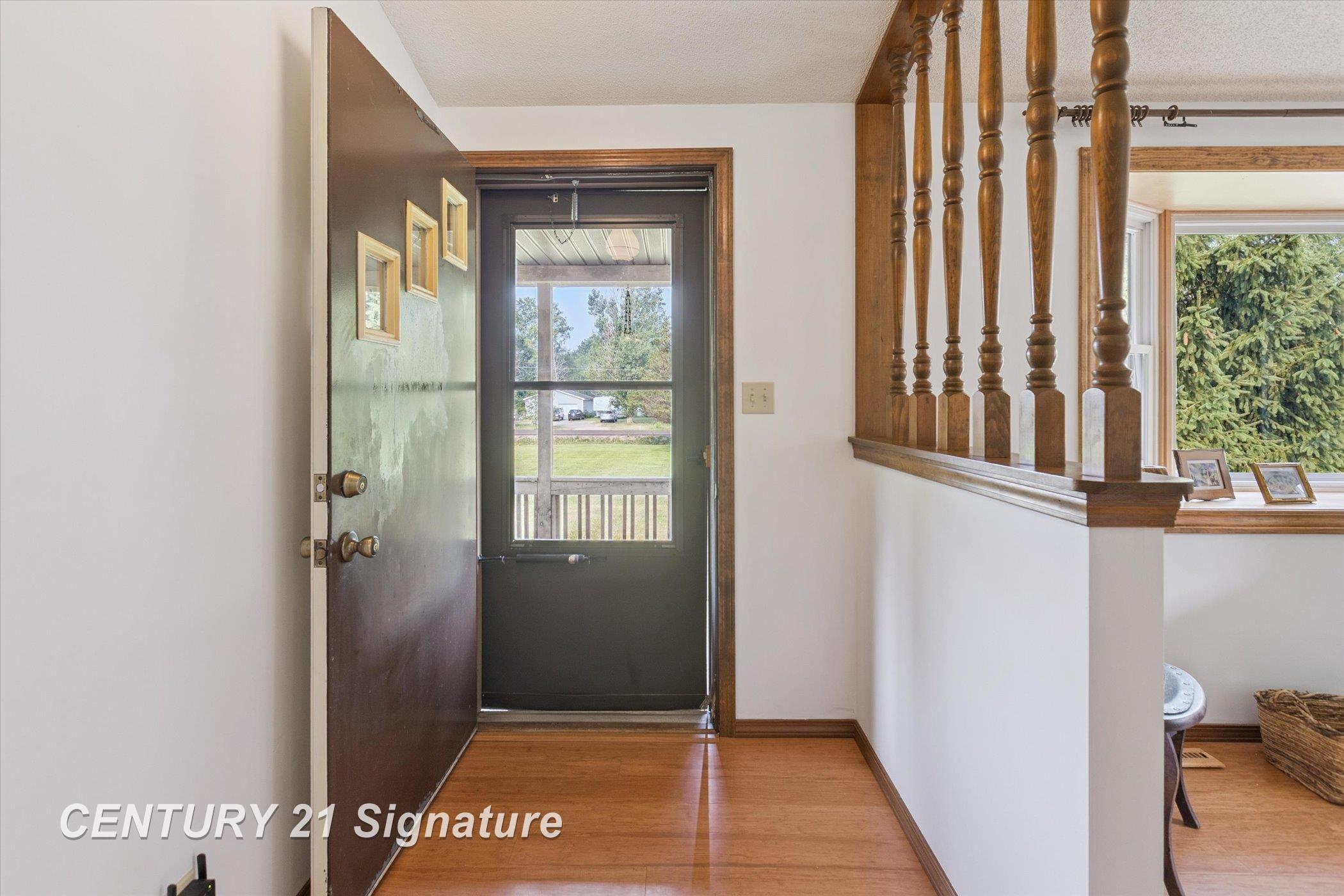 132 North 9 Mile Road Midland, MI 48640 - Photo 11 of 84 Front door entry way