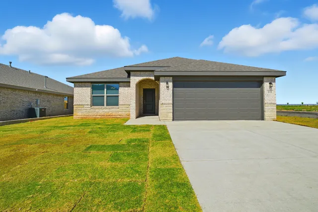 a front view of house with yard