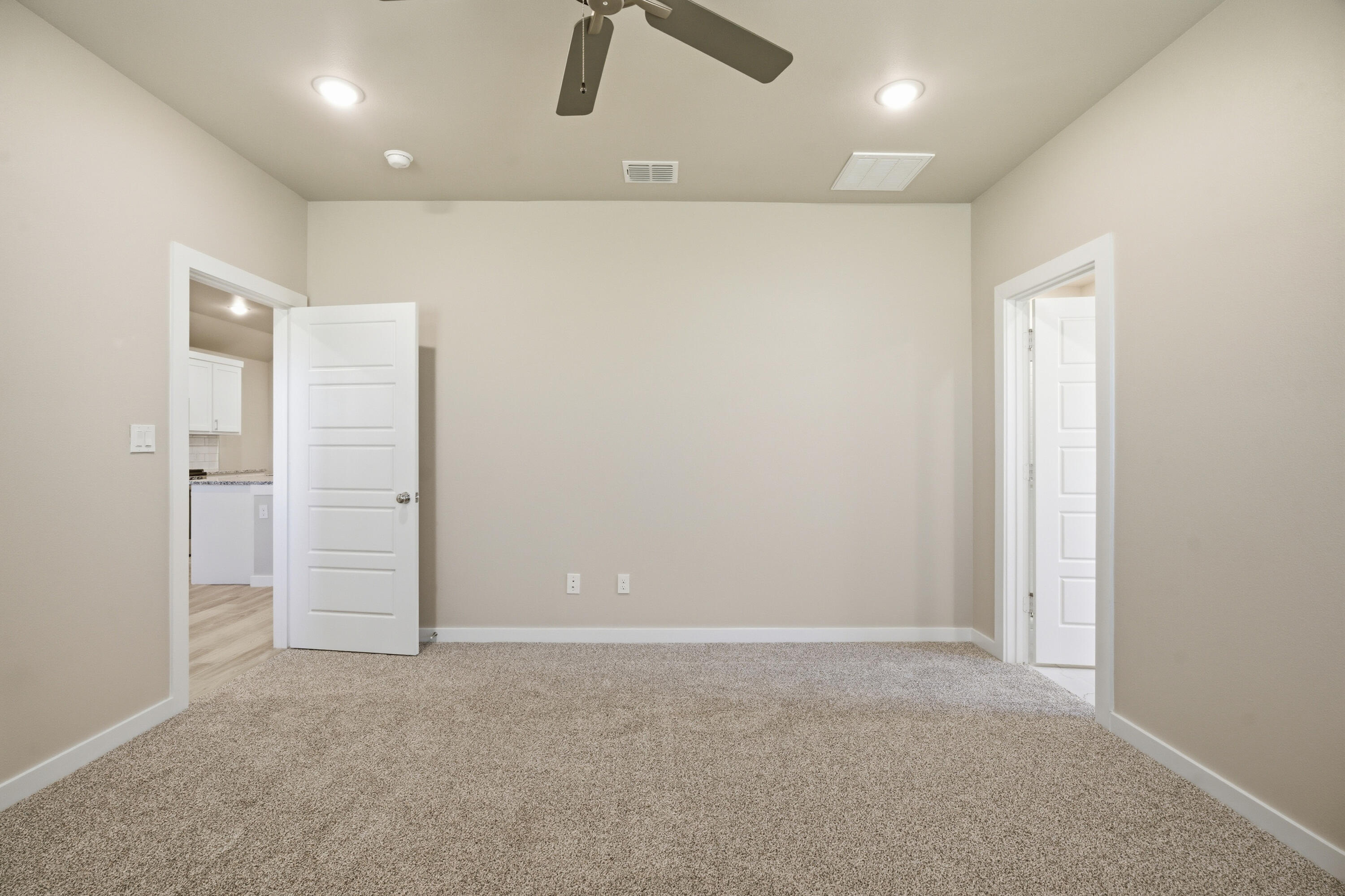 618 East 13th Street Wolfforth, TX 79382 - Photo 18 of 33 an empty room with ceiling fan