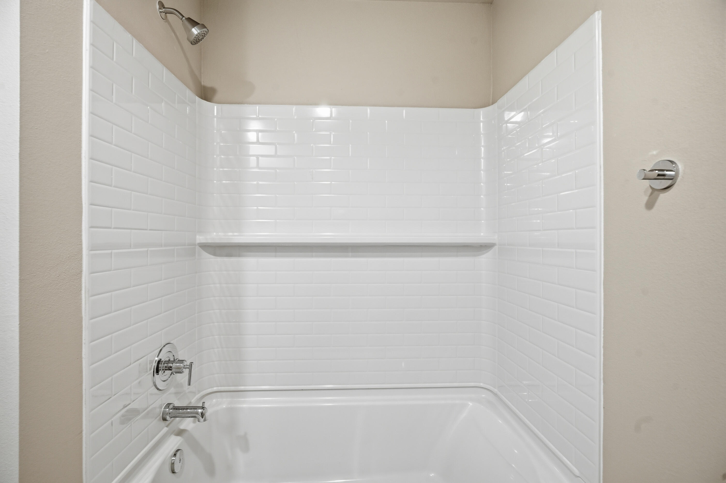 618 East 13th Street Wolfforth, TX 79382 - Photo 28 of 33 a bathroom with a shower