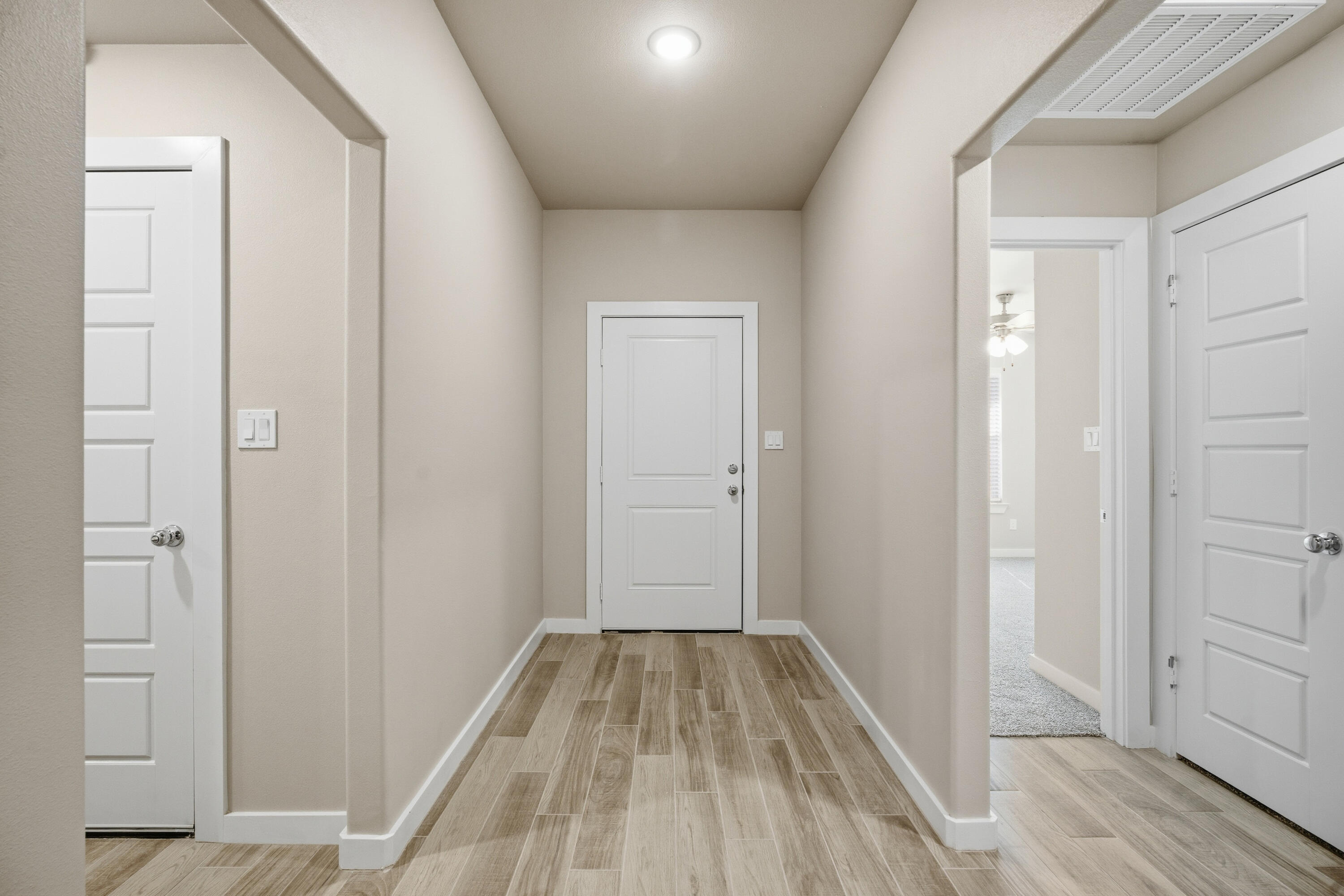 618 East 13th Street Wolfforth, TX 79382 - Photo 3 of 33 wooden floor in an empty room