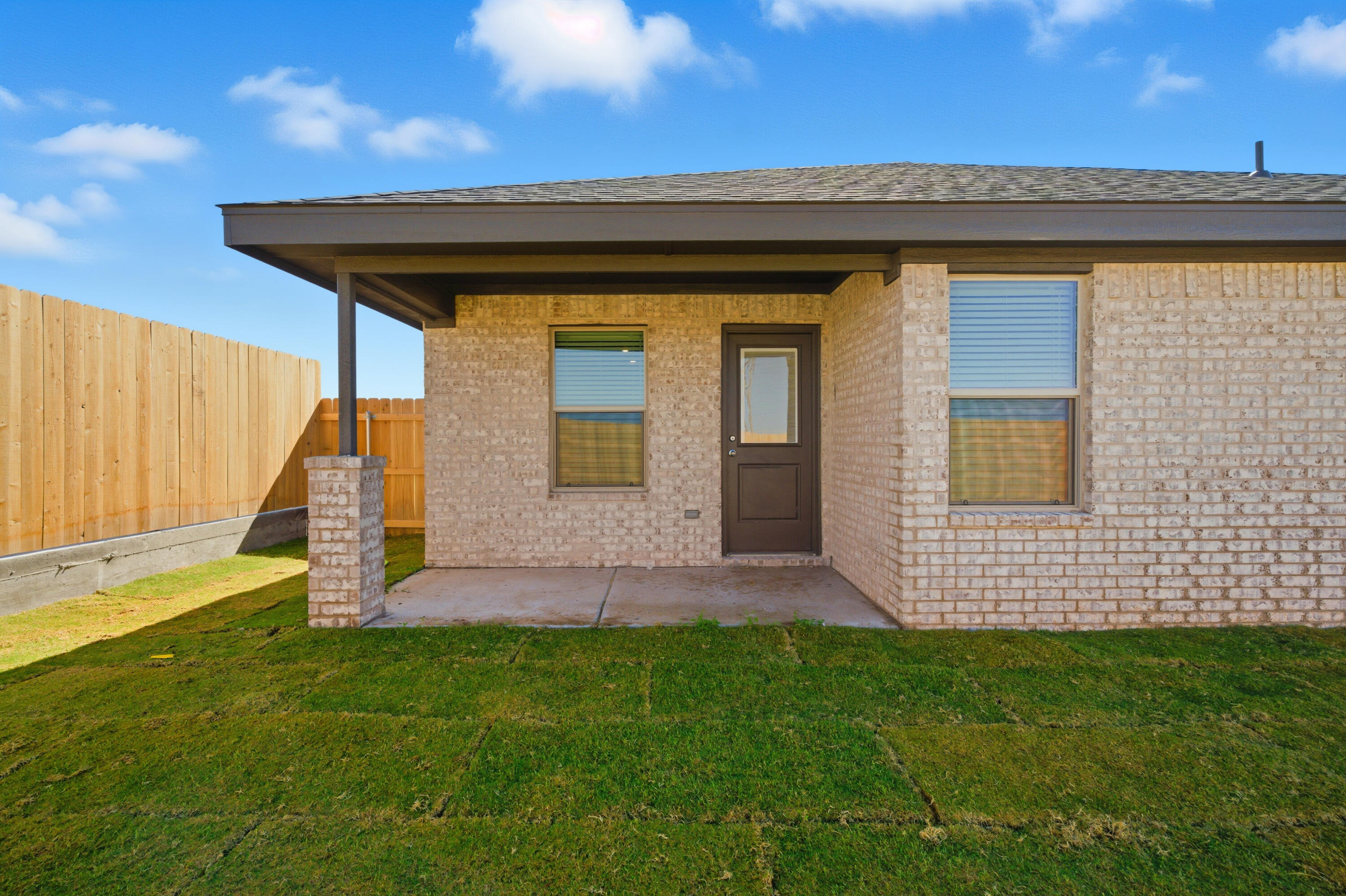 618 East 13th Street Wolfforth, TX 79382 - Photo 31 of 33 a front view of a house with garden
