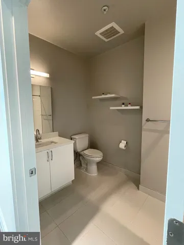 a bathroom with a shower and a bath tub