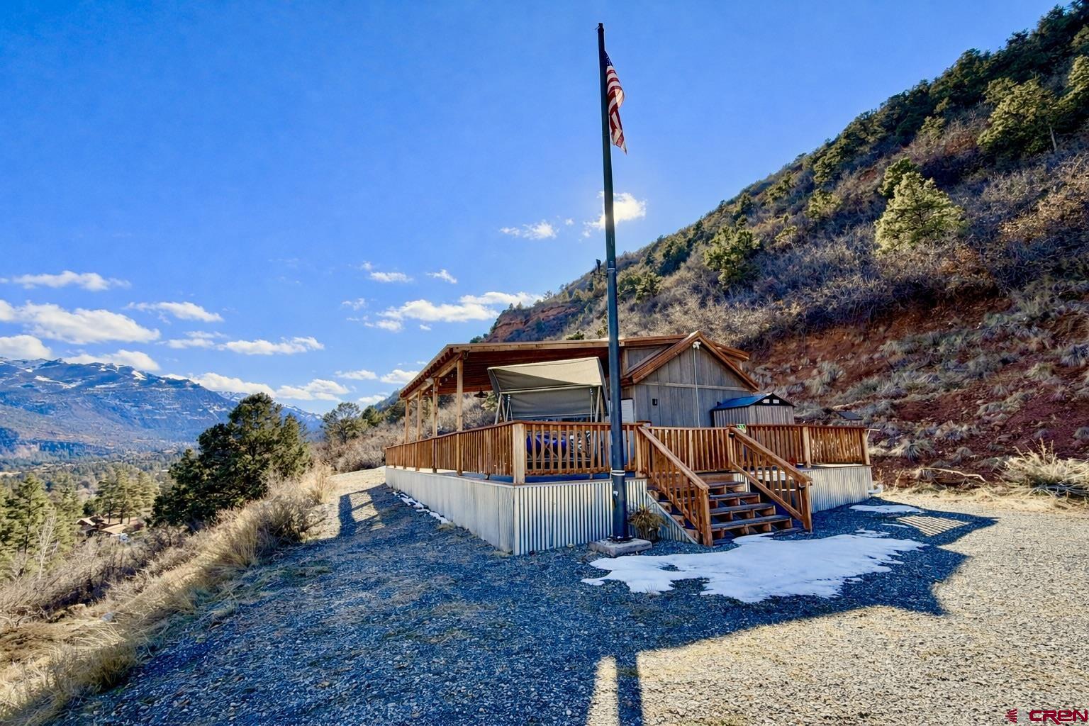 4115 County Road 17 Ridgway, CO 81432 - Photo 3 of 21 a view of a house with a yard