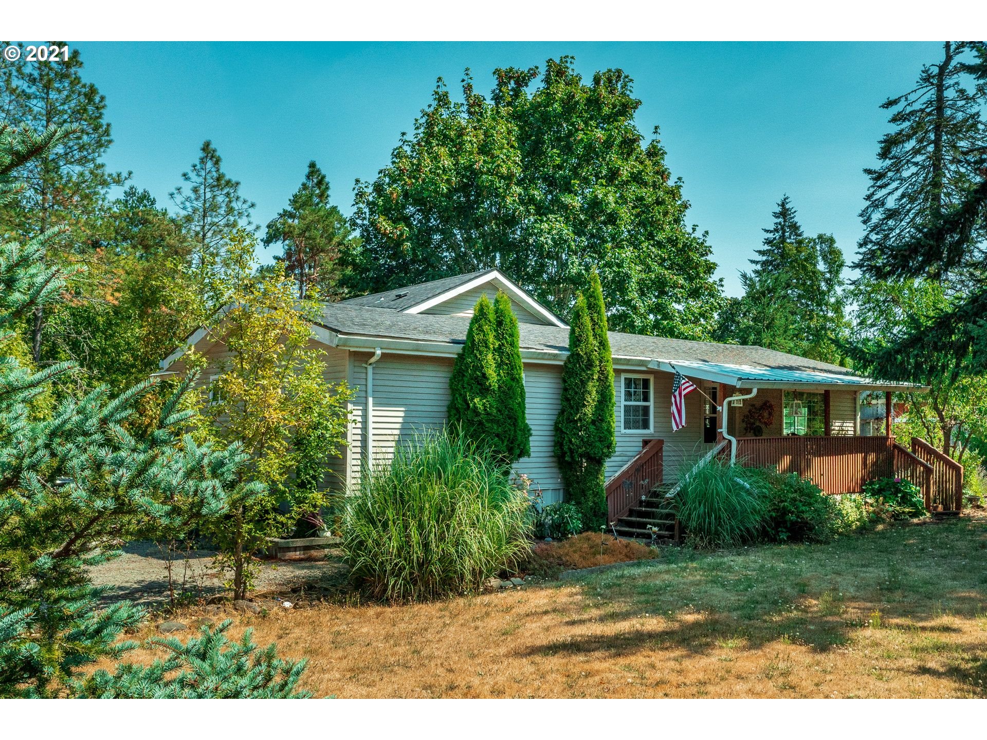 7400 Ash Street Grand Ronde, OR 97347 - Photo 1 of 23 a house view with a garden space