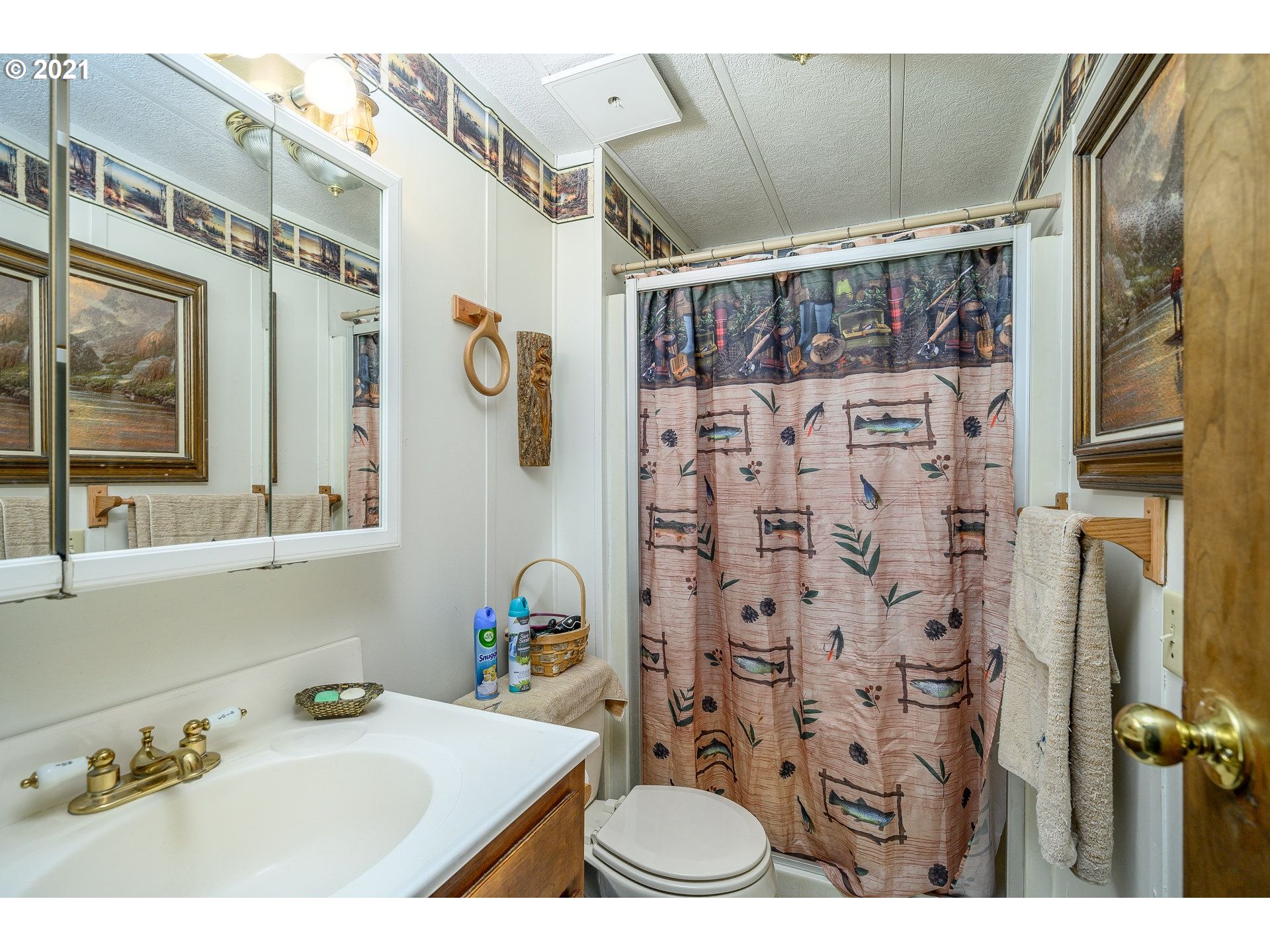 7400 Ash Street Grand Ronde, OR 97347 - Photo 17 of 23 a bathroom with a sink toilet and shower